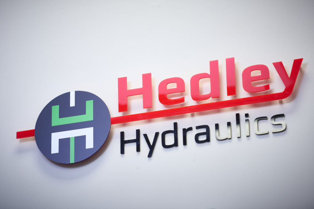Hedley Hydraulics logo on wall